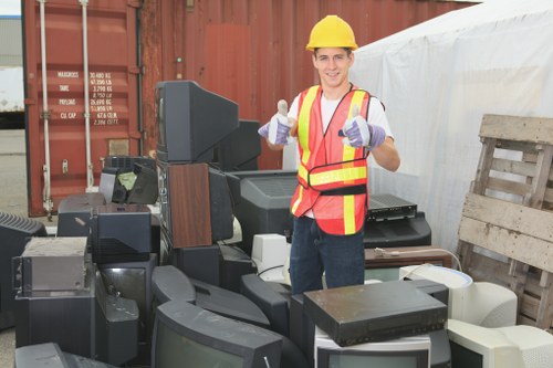 Professional team clearing office furniture in Euston