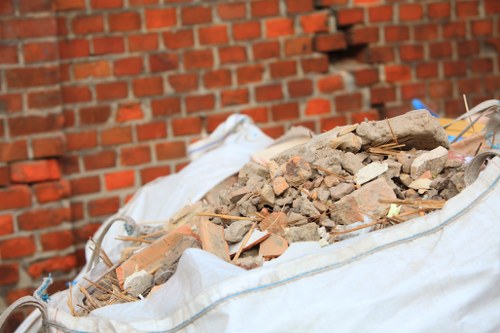 Professional waste clearance team managing construction debris